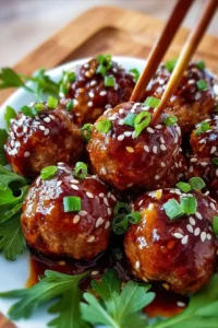 Delicious Asian glazed turkey meatballs garnished with green onions