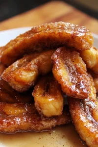 Delicious fried cinnamon bananas served warm with a sprinkle of cinnamon sugar
